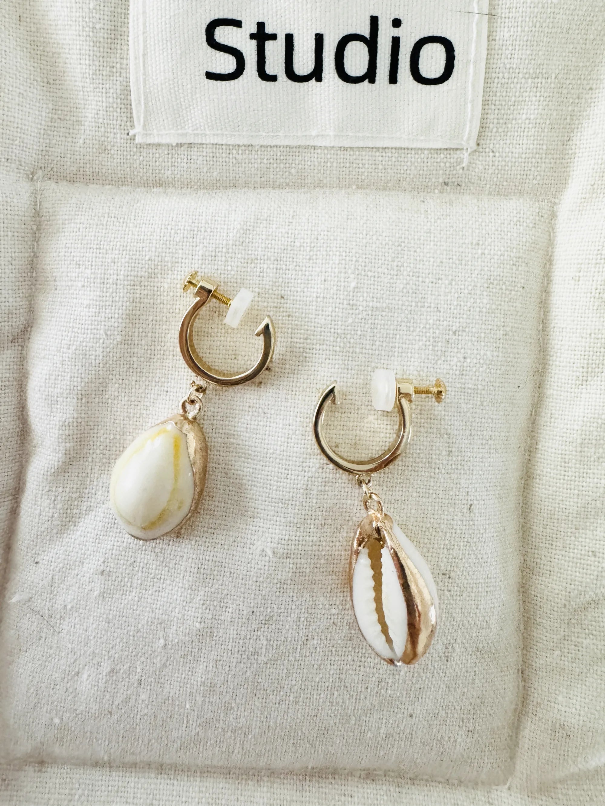 Handmade small white shell clip-on earrings