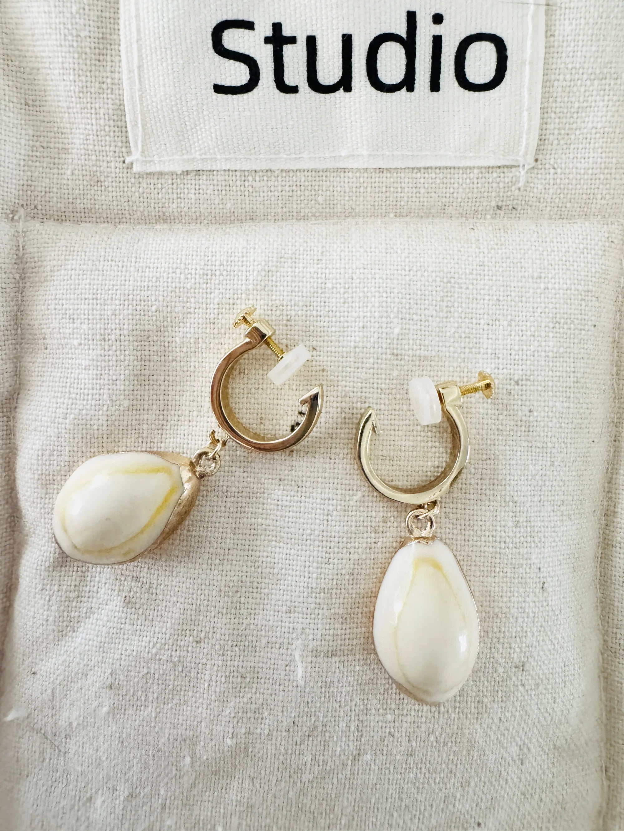Handmade small white shell clip-on earrings